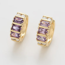 Load image into Gallery viewer, Gold plated huggy earrings with purple zirconia
