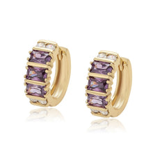 Load image into Gallery viewer, Gold plated huggy earrings with purple zirconia
