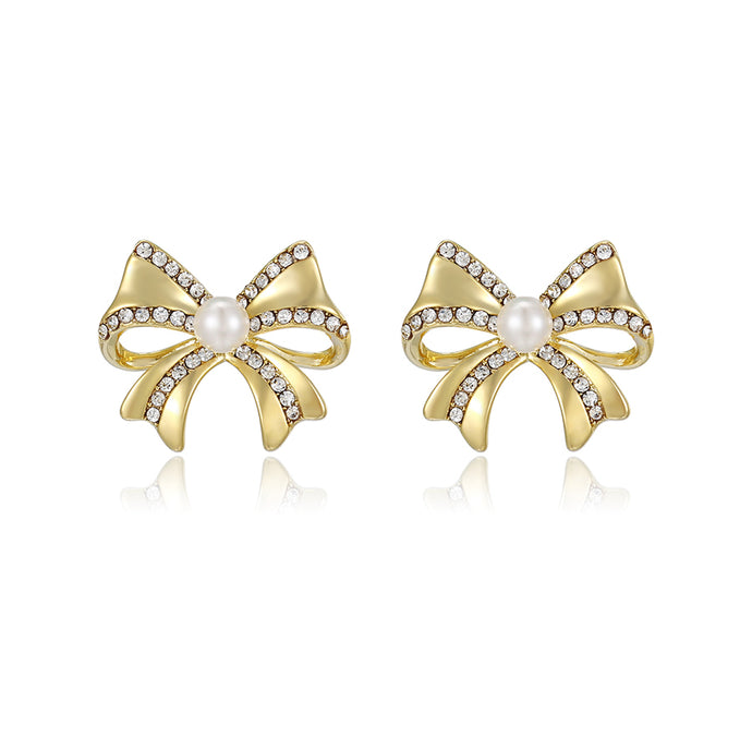 14 K Gold Plated bow earrings with white zirconia